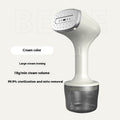 VelaSteam portable garment steamer in cream